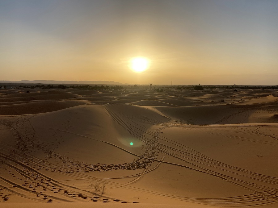 Sunset in the desert. Photo © Gina Nichol.