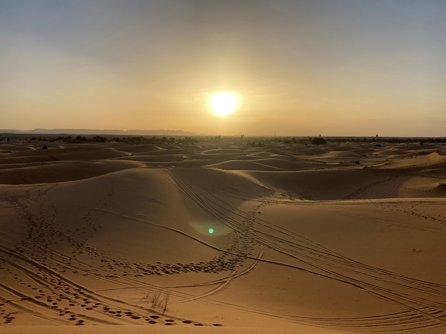 Sunset in the desert. Photo © Gina Nichol.